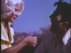 A golden-haired, horny, and seductive milf is attracted to three people.